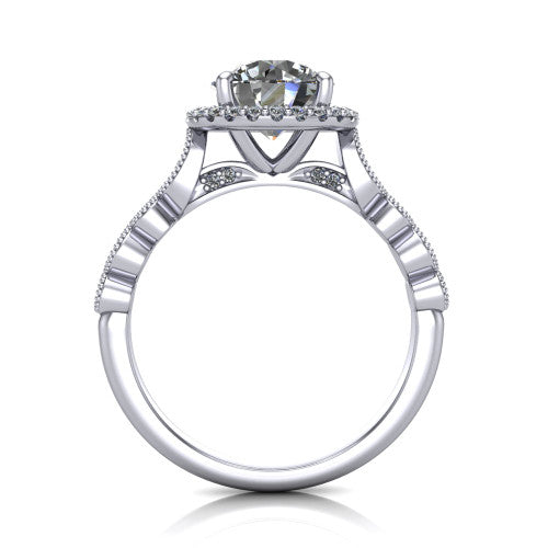 Annie round halo engagement ring in Platinum, through-finger front profile showing the marquise-dot milgrain shoulders and halo from the front
