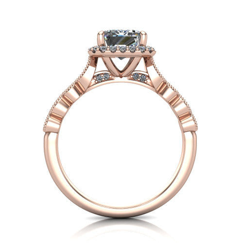 Annie emerald-cut halo engagement ring in 14K Rose Gold, through-finger front profile showing the marquise-dot milgrain shoulders and halo from the front