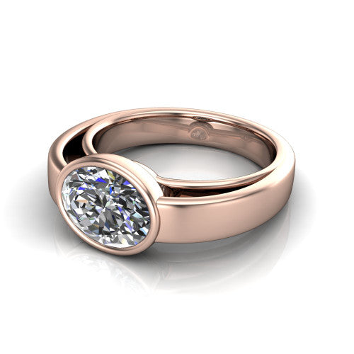 Bony oval classic engagement ring in 14K Rose Gold, three-quarter perspective showing the oval center diamond in a full bezel above a split polished band