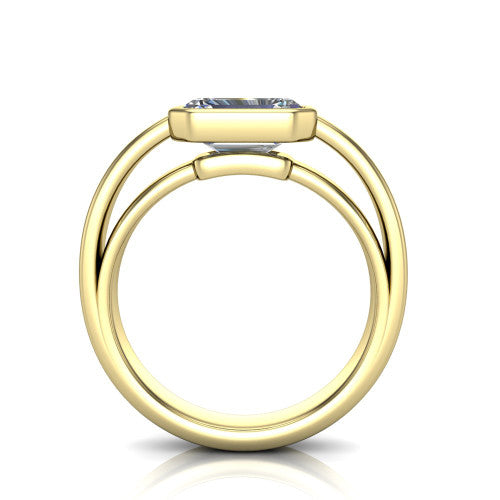 Bony emerald-cut classic engagement ring in 18K Yellow Gold, through-finger front profile showing the bezel and split band from the front