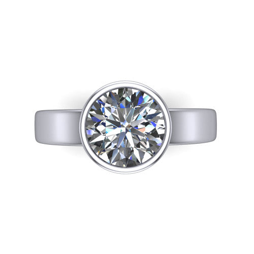 Bony round classic engagement ring in 18K White Gold, top-down view showing the round center diamond framed by the full bezel from above