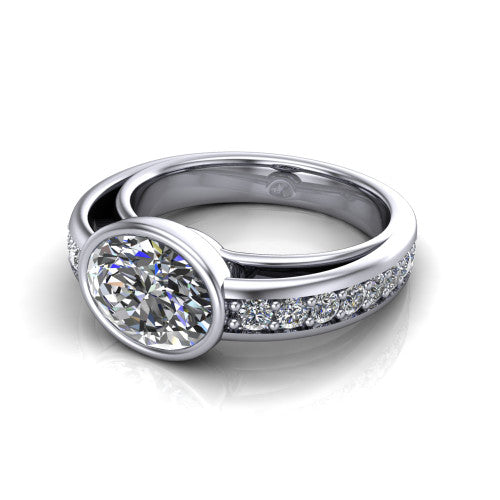 Isabel oval classic engagement ring in 18K White Gold, three-quarter perspective showing the oval center diamond in a full bezel above a split diamond band
