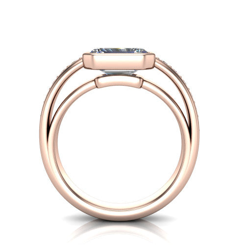 Isabel emerald-cut classic engagement ring in 18K Rose Gold, through-finger front profile showing the bezel and split channel-set band from the front