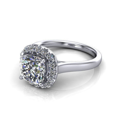 Reese cushion halo engagement ring in Platinum, three-quarter perspective showing the cushion center diamond in a pave halo above a thin band