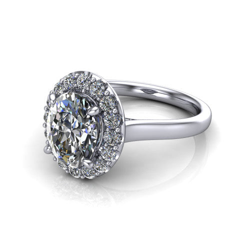 Reese oval halo engagement ring in Platinum, three-quarter perspective showing the oval center diamond in a pave halo above a thin band