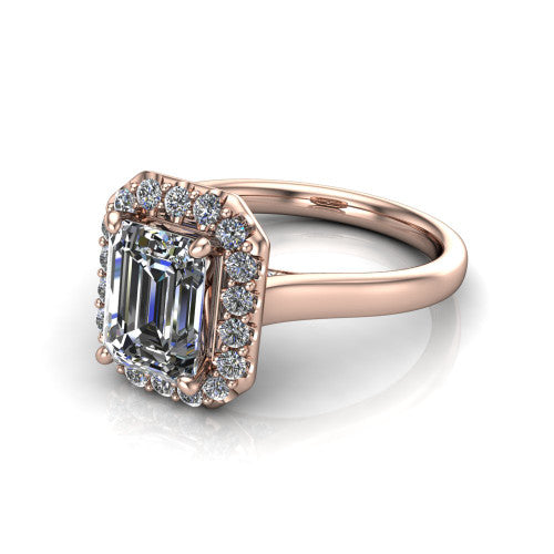 Reese emerald-cut halo engagement ring in 14K Rose Gold, three-quarter perspective showing the emerald-cut center diamond in a pave halo above a thin band