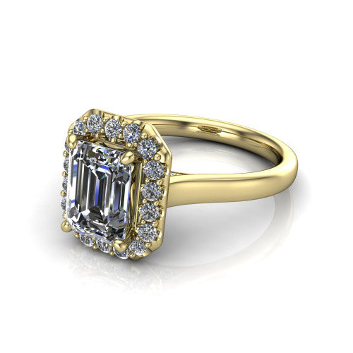 Reese emerald-cut halo engagement ring in 18K Yellow Gold, three-quarter perspective showing the emerald-cut center diamond in a pave halo above a thin band