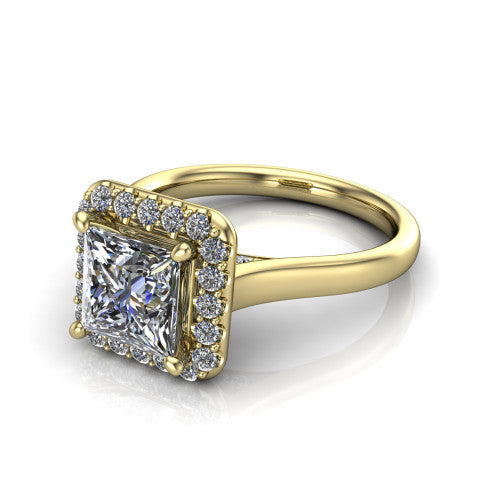 Reese princess-cut halo engagement ring in 18K Yellow Gold, three-quarter perspective showing the princess-cut center diamond in a pave halo above a thin band