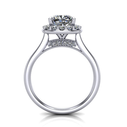 Reese cushion halo engagement ring in Platinum, through-finger front profile showing the hidden accent and halo from the front
