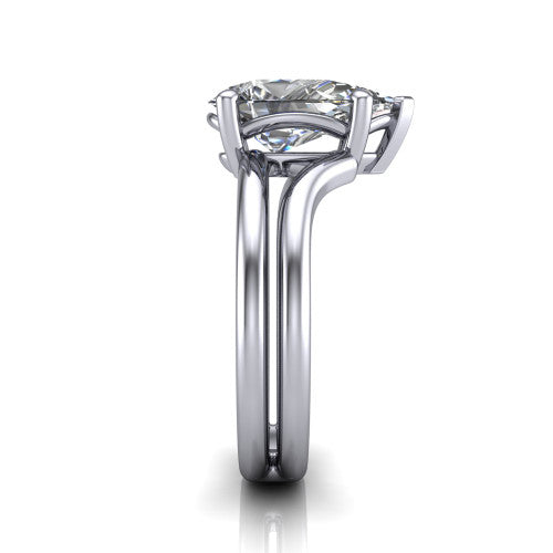 Khloe pear classic engagement ring in Platinum, side profile showing the split polished band in side view