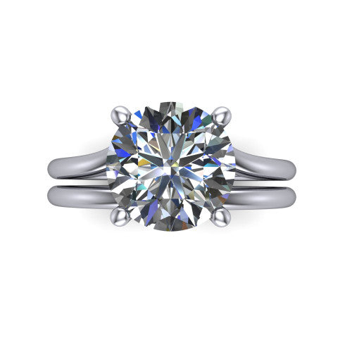 Khloe round classic engagement ring in Platinum, top-down view showing the round center diamond in its four-prong head from above