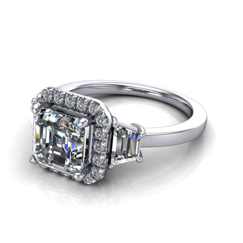 Anabella square emerald-cut halo engagement ring in 14K White Gold, three-quarter perspective showing the square emerald-cut center diamond, pave halo, and two trapezoid side stones