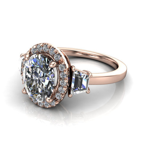Anabella oval halo engagement ring in 18K Rose Gold, three-quarter perspective showing the oval center diamond, pave halo, and two trapezoid side stones