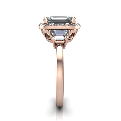 Anabella emerald-cut halo engagement ring in 18K Rose Gold, side profile showing the halo, side stones, and polished band in profile