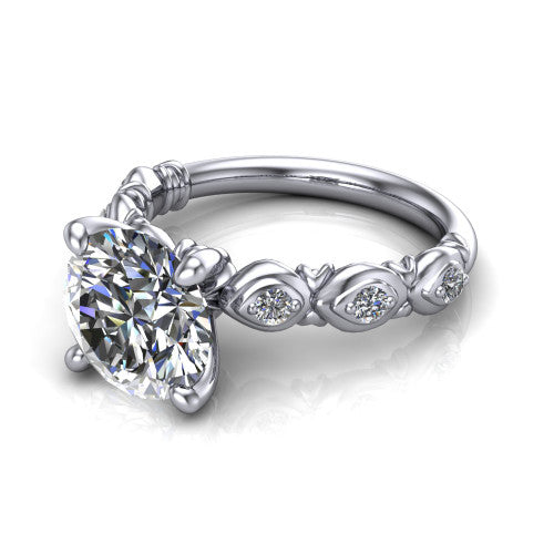 Nyla round solitaire engagement ring in 14K White Gold, three-quarter perspective showing the round center diamond above a vintage marquise-station accent band