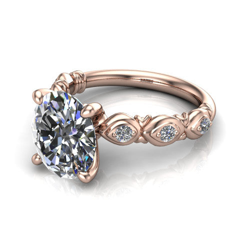 Nyla oval solitaire engagement ring in 14K Rose Gold, three-quarter perspective showing the oval center diamond above a vintage marquise-station accent band
