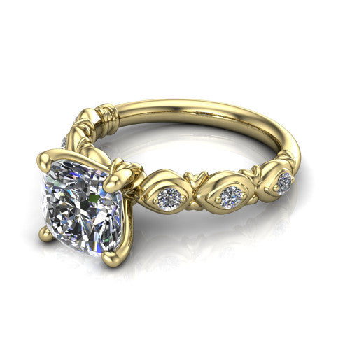 Nyla cushion solitaire engagement ring in 14K Yellow Gold, three-quarter perspective showing the cushion center diamond above a vintage marquise-station accent band