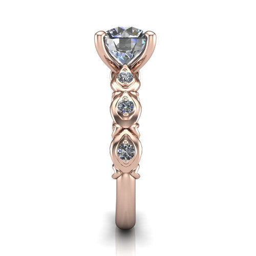 Nyla round solitaire engagement ring in 14K Rose Gold, side profile showing the vintage station band in side view