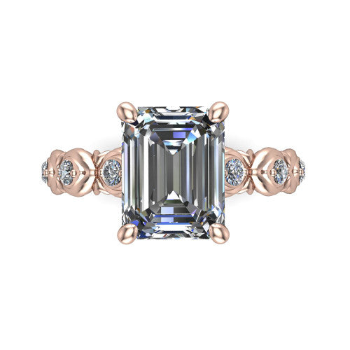 Nyla emerald-cut solitaire engagement ring in 14K Rose Gold, top-down view showing the emerald-cut center diamond and station shoulders from above