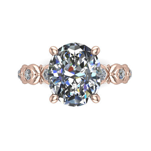 Nyla oval solitaire engagement ring in 18K Rose Gold, top-down view showing the oval center diamond and station shoulders from above