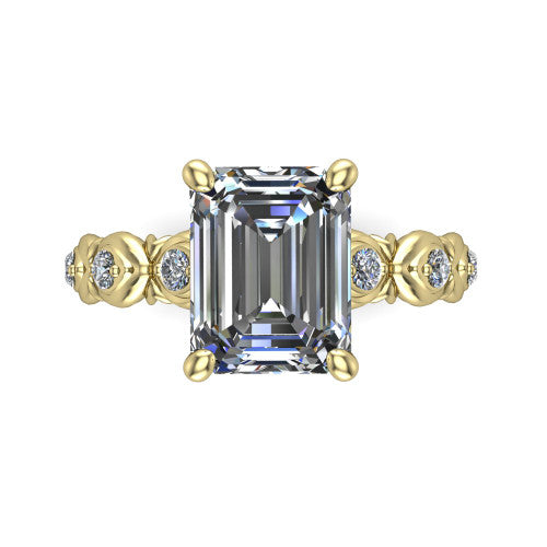 Nyla emerald-cut solitaire engagement ring in 18K Yellow Gold, top-down view showing the emerald-cut center diamond and station shoulders from above