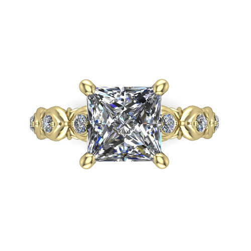 Nyla princess-cut solitaire engagement ring in 18K Yellow Gold, top-down view showing the princess-cut center diamond and station shoulders from above