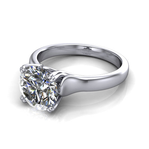 Faith round classic engagement ring in Platinum, three-quarter perspective showing the round center diamond in a four-prong cathedral head on a polished band