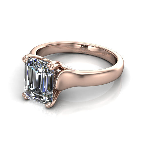 Faith emerald-cut classic engagement ring in 14K Rose Gold, three-quarter perspective showing the emerald-cut center diamond in a four-prong cathedral head on a polished band