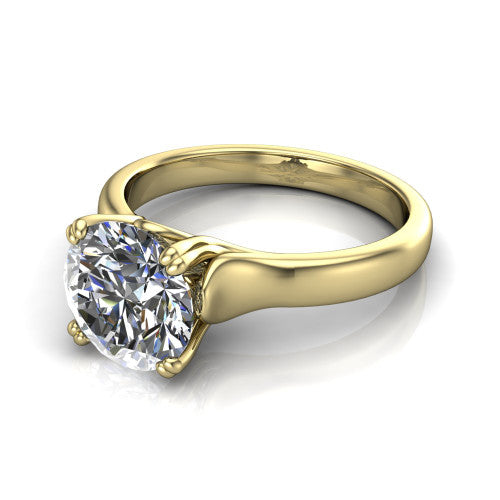 Faith round classic engagement ring in 18K Yellow Gold, three-quarter perspective showing the round center diamond in a four-prong cathedral head on a polished band