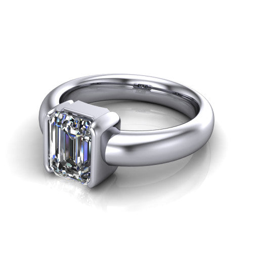 Morgan emerald-cut classic engagement ring in 18K White Gold, three-quarter perspective showing the emerald-cut center diamond in a half-bezel on a wide polished band