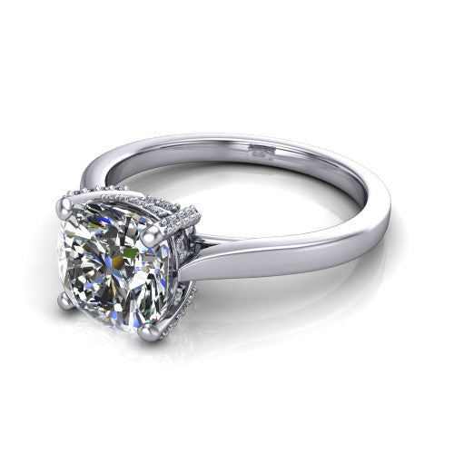 Finley cushion classic engagement ring in Platinum, three-quarter perspective showing the cushion center diamond in a four-prong head with a hidden halo
