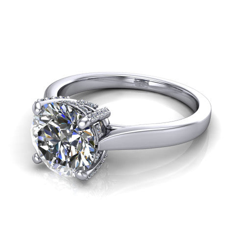 Finley round classic engagement ring in 14K White Gold, three-quarter perspective showing the round center diamond in a four-prong head with a hidden halo