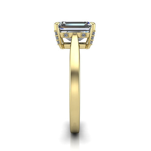 Finley emerald-cut classic engagement ring in 18K Yellow Gold, side profile showing the hidden halo and polished band in side view