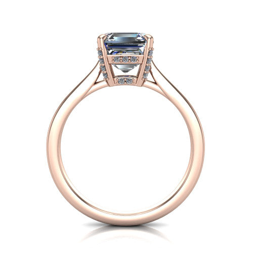 Finley square emerald-cut classic engagement ring in 14K Rose Gold, through-finger front profile showing the hidden halo beneath the basket from the front