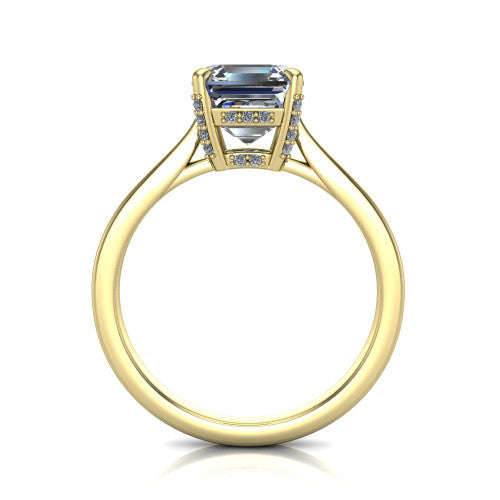 Finley square emerald-cut classic engagement ring in 18K Yellow Gold, through-finger front profile showing the hidden halo beneath the basket from the front
