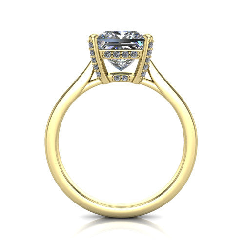 Finley princess-cut classic engagement ring in 18K Yellow Gold, through-finger front profile showing the hidden halo beneath the basket from the front