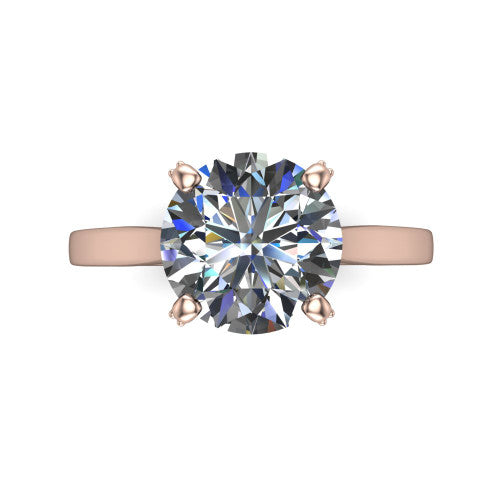 Finley round classic engagement ring in 18K Rose Gold, top-down view showing the round center diamond and four prongs from above