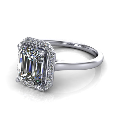 Andrea emerald-cut halo engagement ring in 14K White Gold, three-quarter perspective showing the emerald-cut center diamond in a pave halo above a thin band