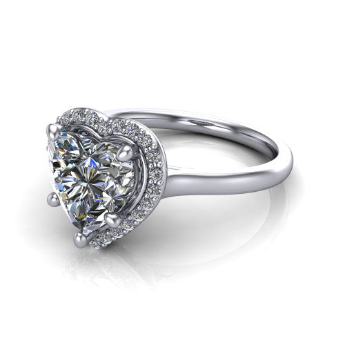 Dream heart halo engagement ring in Platinum, three-quarter perspective showing the heart center diamond in a pave halo with a leaf-inspired gallery