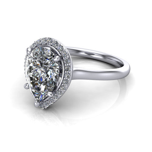 Dream pear halo engagement ring in Platinum, three-quarter perspective showing the pear center diamond in a pave halo with a leaf-inspired gallery