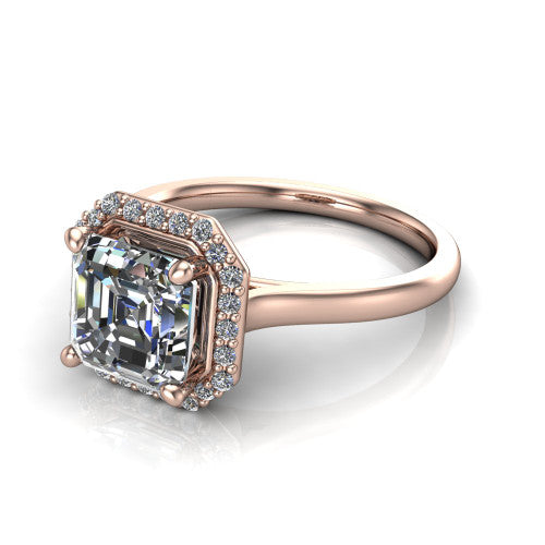Dream square emerald halo engagement ring in 14K Rose Gold, three-quarter perspective showing the square emerald center diamond in a pave halo with a leaf-inspired gallery