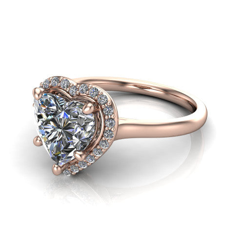 Dream heart halo engagement ring in 18K Rose Gold, three-quarter perspective showing the heart center diamond in a pave halo with a leaf-inspired gallery