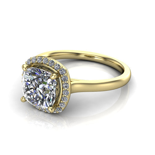 Dream cushion halo engagement ring in 14K Yellow Gold, three-quarter perspective showing the cushion center diamond in a pave halo with a leaf-inspired gallery