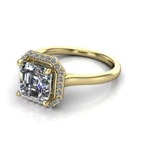 Dream square emerald halo engagement ring in 18K Yellow Gold, three-quarter perspective showing the square emerald center diamond in a pave halo with a leaf-inspired gallery