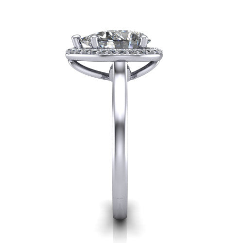 Dream pear halo engagement ring in Platinum, side profile showing the cathedral shoulders and leaf-inspired basket gallery