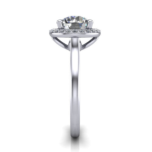 Dream round halo engagement ring in Platinum, side profile showing the cathedral shoulders and leaf-inspired basket gallery