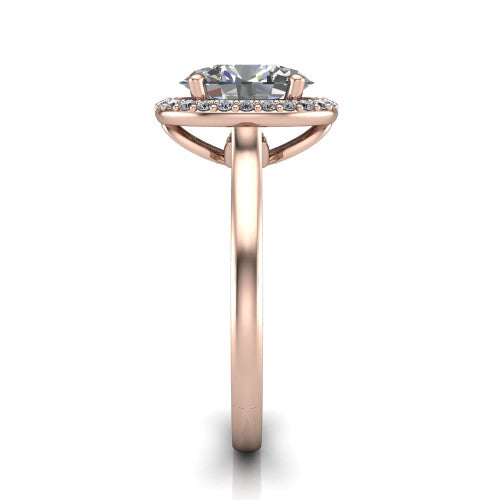 Dream oval halo engagement ring in 14K Rose Gold, side profile showing the cathedral shoulders and leaf-inspired basket gallery
