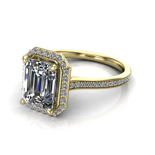 Delaney emerald halo engagement ring in 14K Yellow Gold, three-quarter perspective showing the emerald center diamond in a pave halo above a pave band