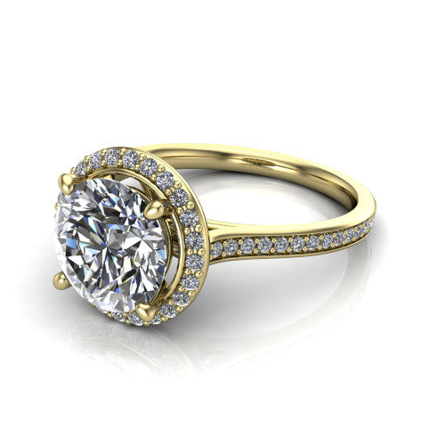 Delaney round halo engagement ring in 14K Yellow Gold, three-quarter perspective showing the round center diamond in a pave halo above a pave band