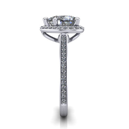 Delaney heart halo engagement ring in Platinum, side profile showing the leaf basket and pave band